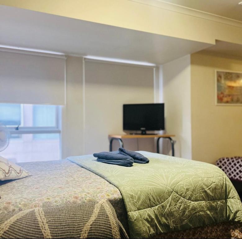 Photo de la galerie de l'établissement Studio Apartment in Melbourne CBD, à Melbourne