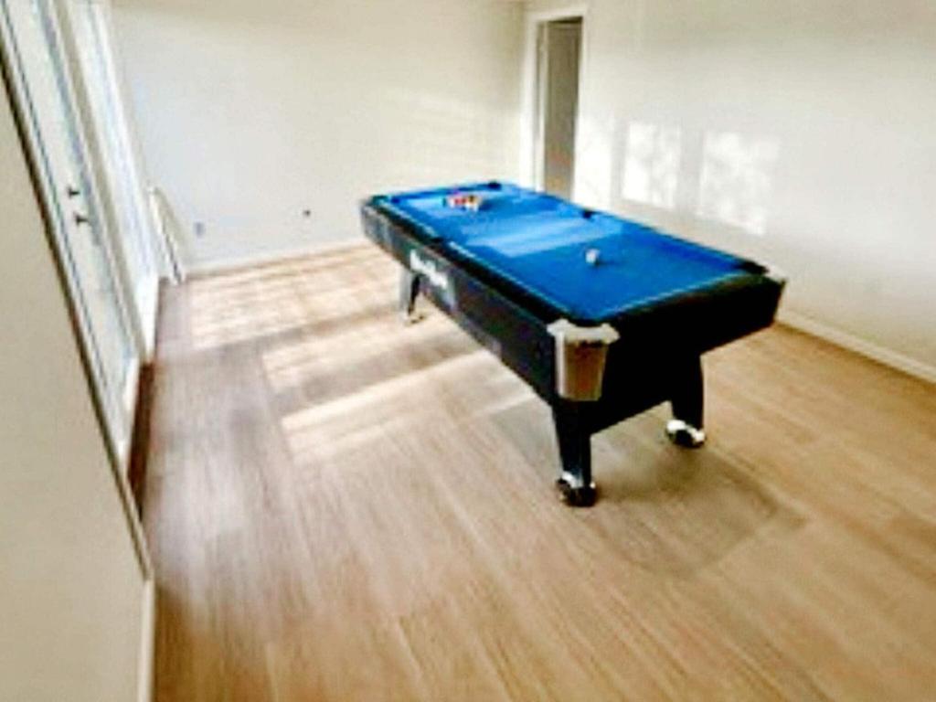 a pool table in a living room with at Holiday home Skjern XI in Skjern