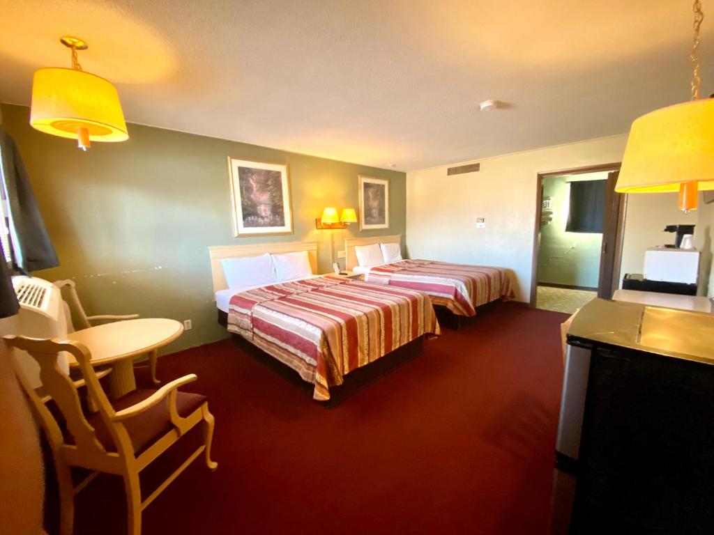 Voodi või voodid majutusasutuse Hillcrest Motel toas