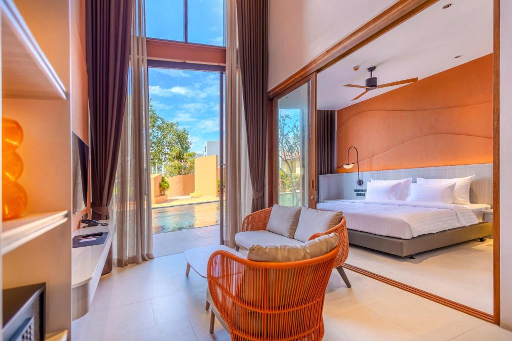 Postel nebo postele na pokoji v ubytování Hotel Adam Krabi