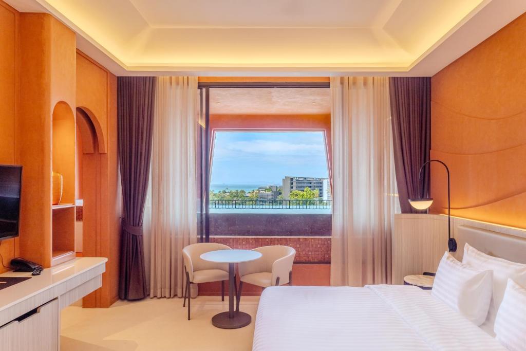 Postel nebo postele na pokoji v ubytování Hotel Adam Krabi