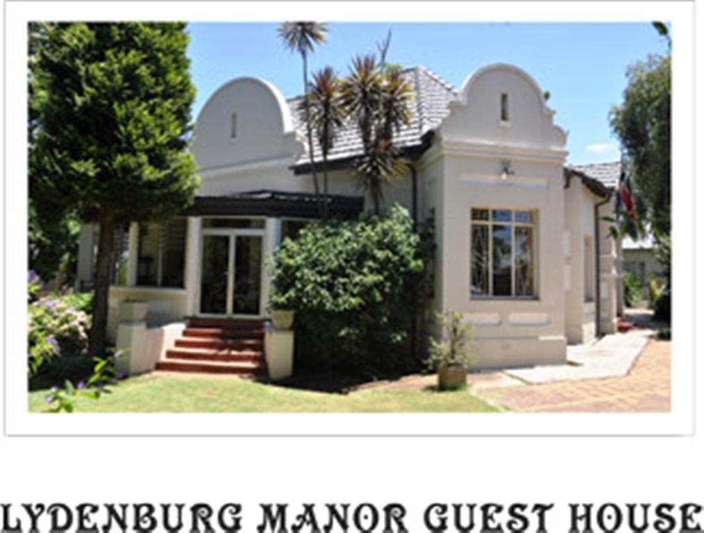 a house with a sign that reads hyannis guest house at Lydenburg Manor Guest House in Lydenburg