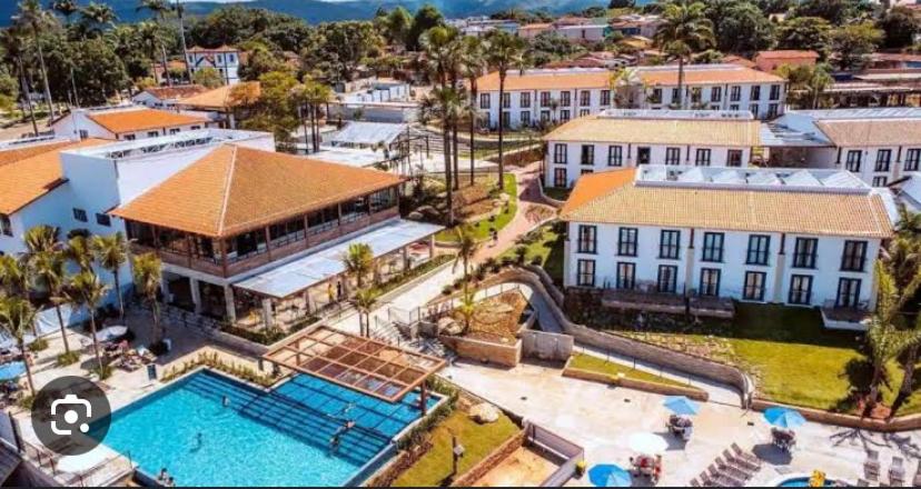 an aerial view of a resort with a swimming pool at Quinta Santa Bárbara eco resort in Pirenópolis