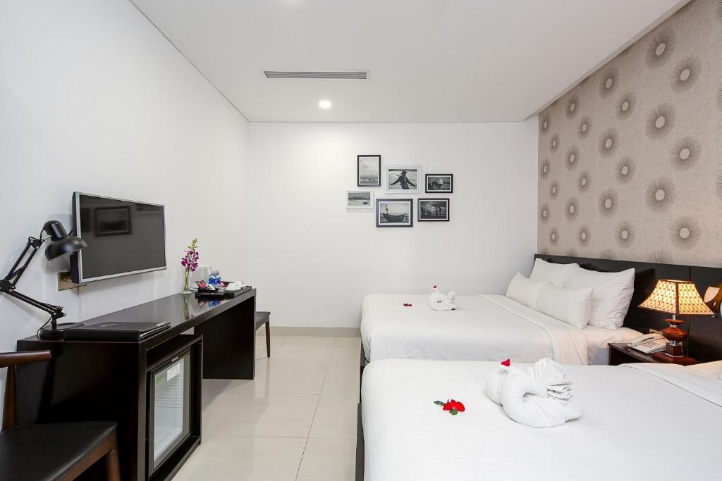 TV a/nebo společenská místnost v ubytování Dylan Hotel Danang