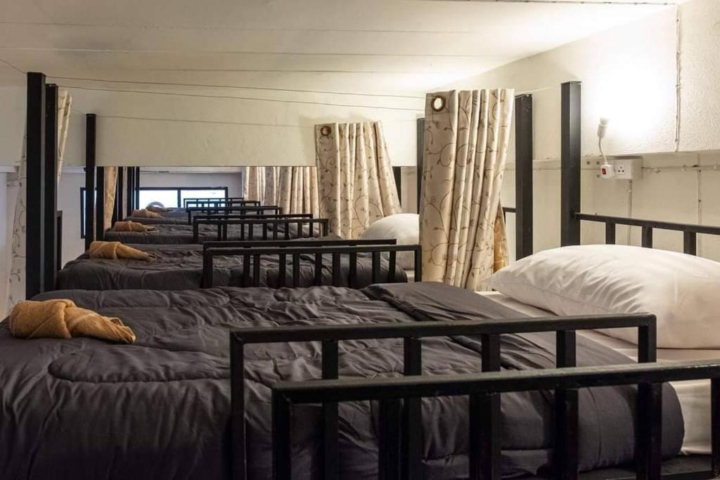 Postel nebo postele na pokoji v ubytování Hug pai hostel