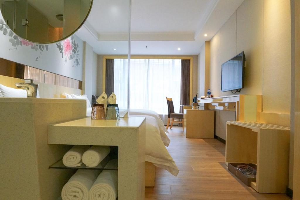 TV a/nebo společenská místnost v ubytování Paco Hotel Ouzhuang Metro Guangzhou-Free shuttle to Canton fair