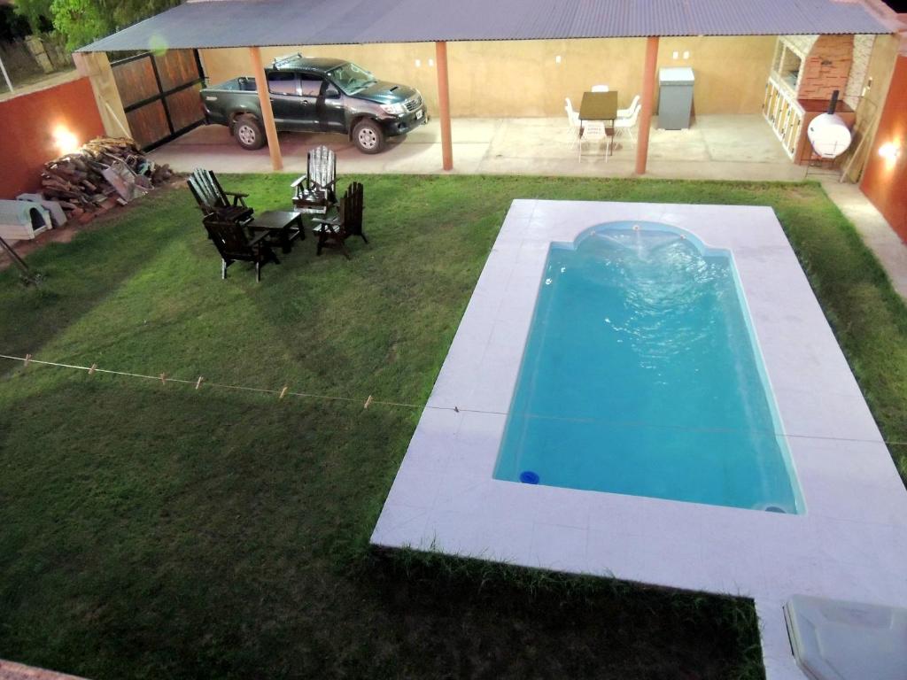 an overhead view of a backyard with a swimming pool at Alquiler de casa El Oeste in Villa Unión
