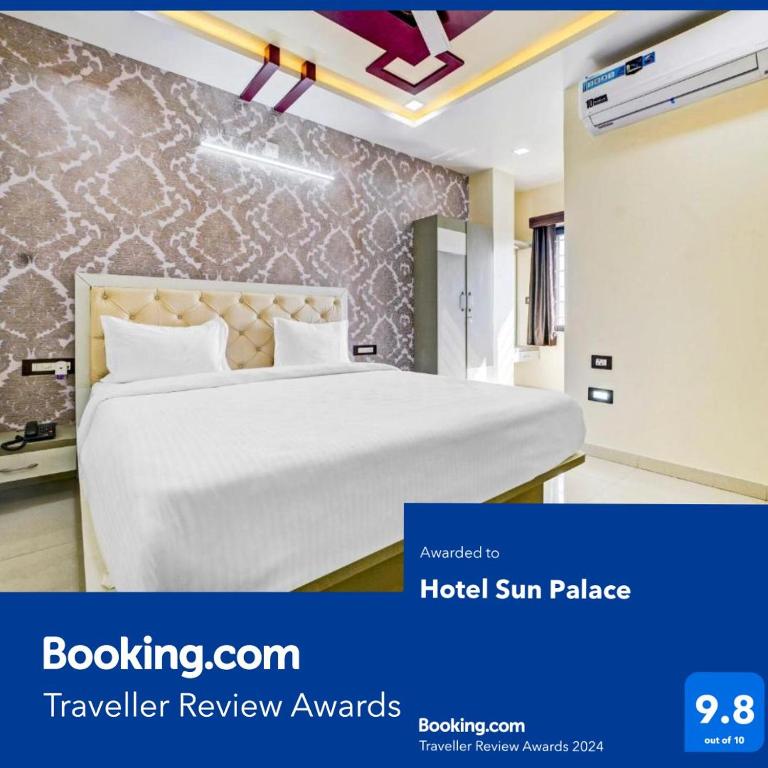 Postel nebo postele na pokoji v ubytování Hotel Sun Palace