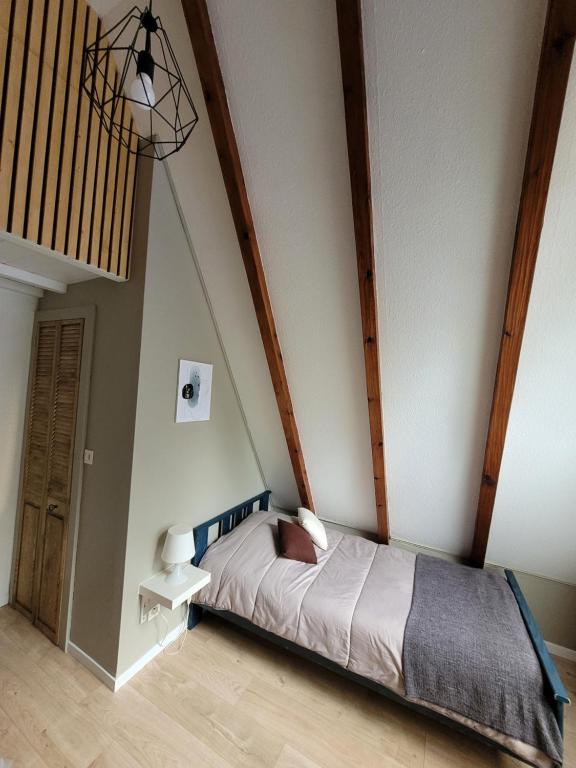 Postel nebo postele na pokoji v ubytování Gite Delphine