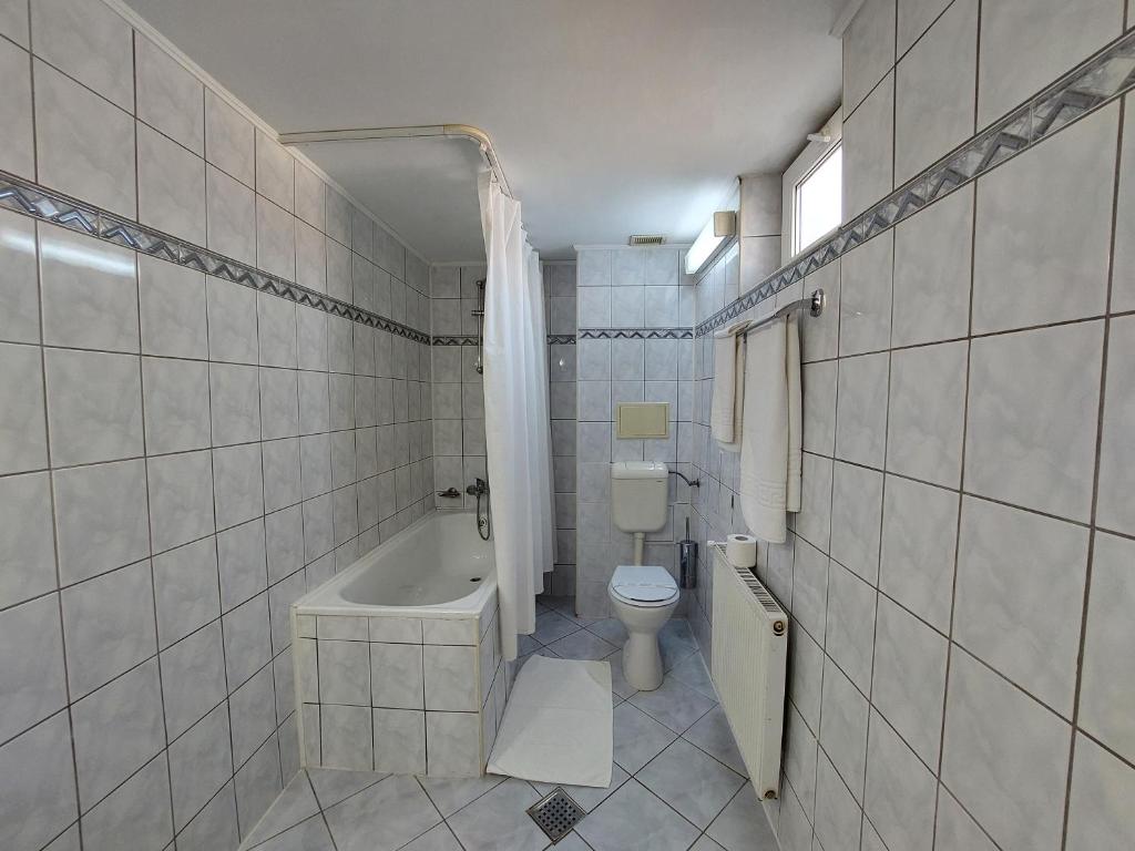 Koupelna v ubytování Hotel Egreta