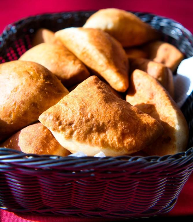 a basket filled with breads in a red at After 40 Hotel in Nairobi