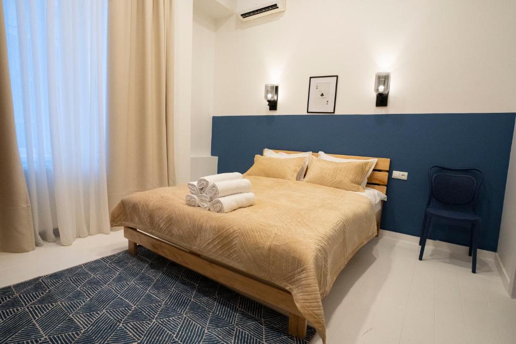 Postel nebo postele na pokoji v ubytování Sulitzer Residence