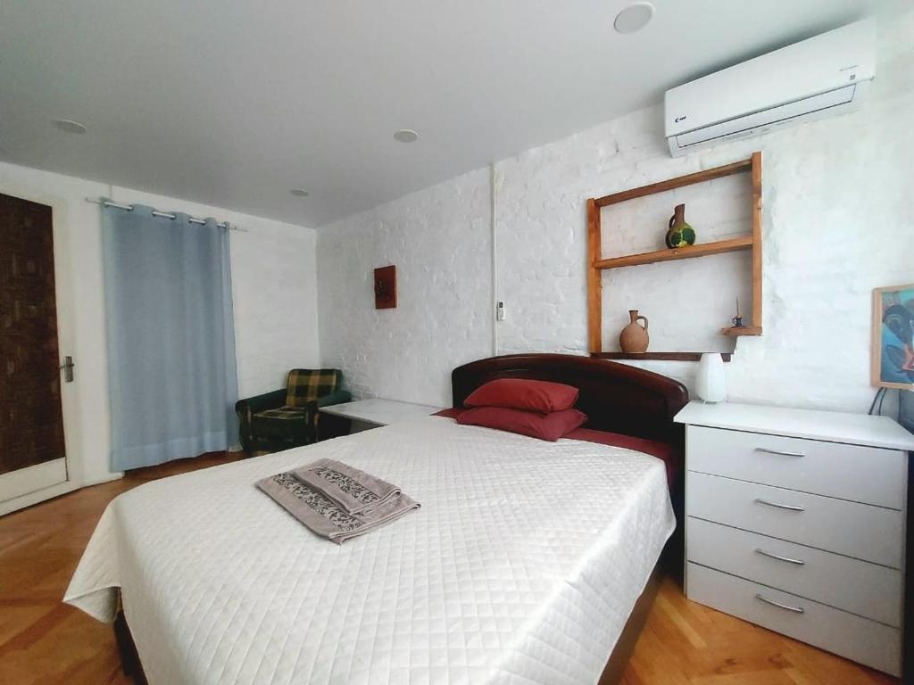 Postel nebo postele na pokoji v ubytování Sani house.