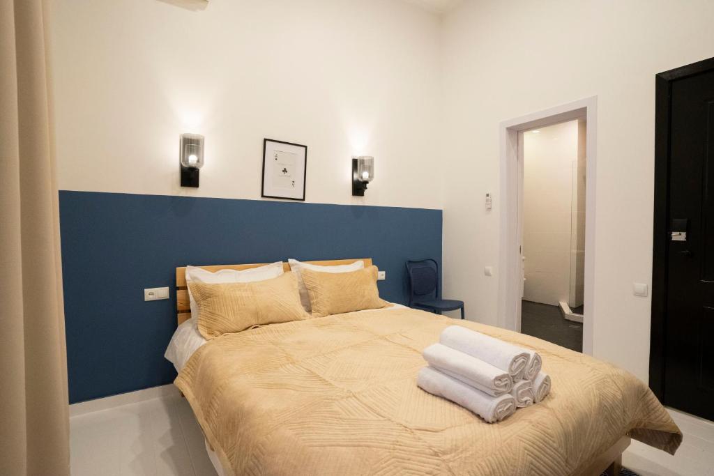 Postel nebo postele na pokoji v ubytování Sulitzer Residence
