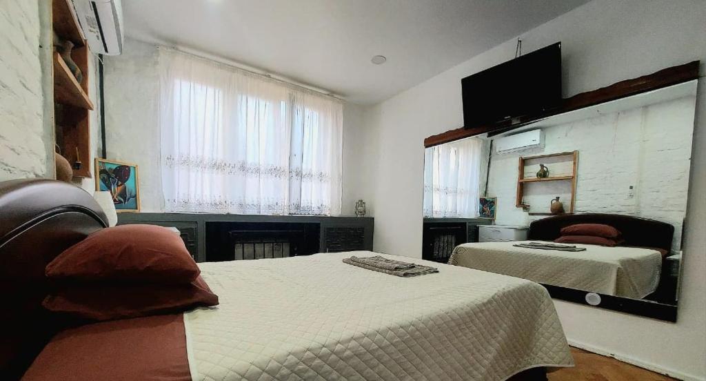 Postel nebo postele na pokoji v ubytování Sani house.