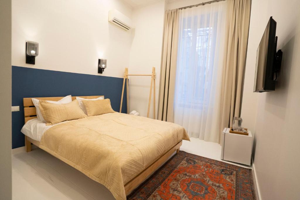 Postel nebo postele na pokoji v ubytování Sulitzer Residence