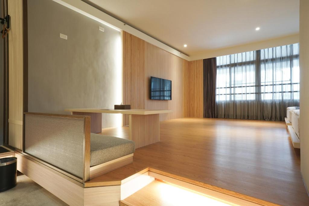 TV a/nebo společenská místnost v ubytování Hoya Hot Springs Resort, Guanziling