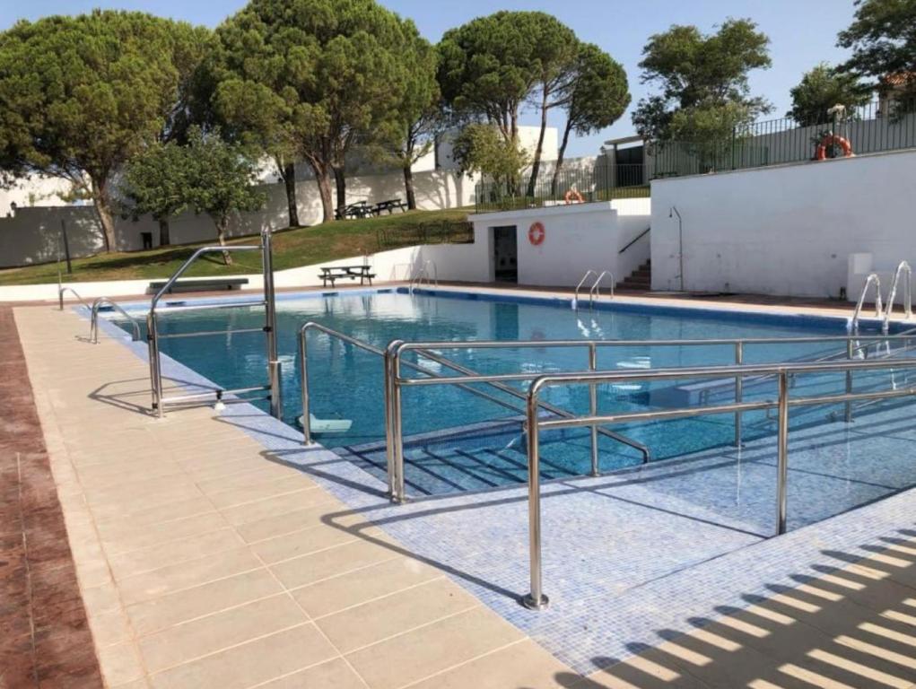 a swimming pool with aicrobialicrobialicrobialicrobialicrobialicrobialicrobialicrobial at Casa Mar y Montaña in Paterna de Rivera
