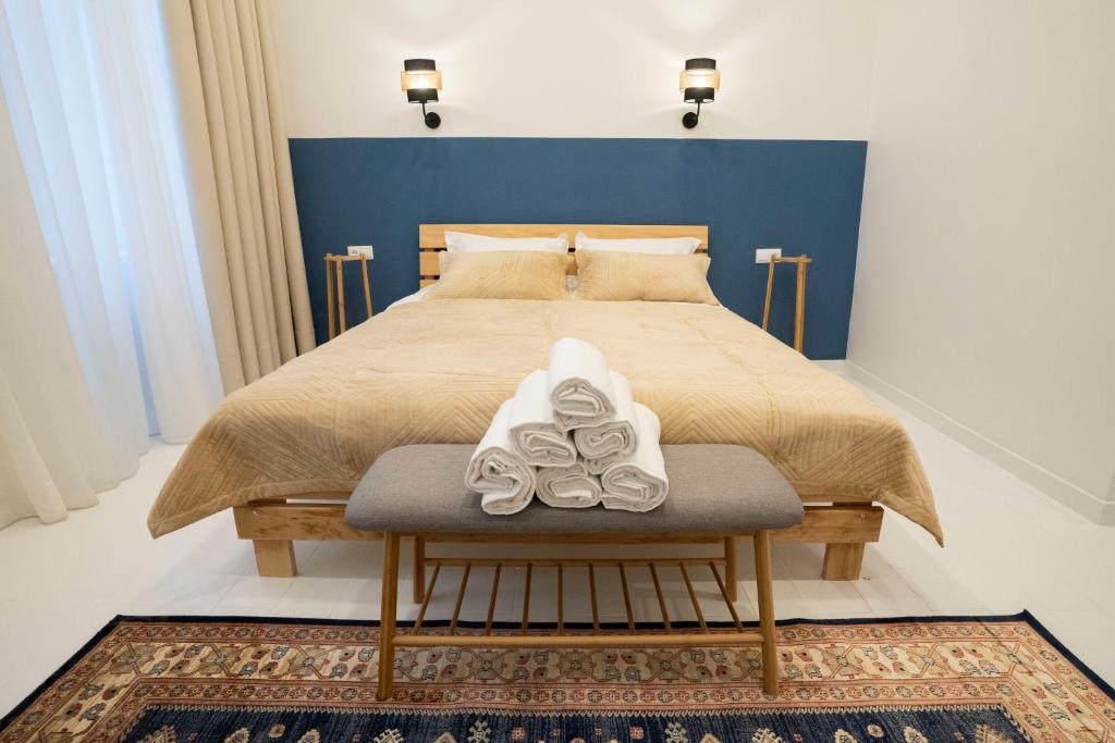 Postel nebo postele na pokoji v ubytování Sulitzer Residence
