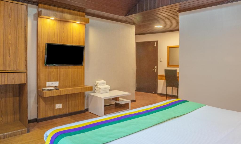 TV a/nebo společenská místnost v ubytování Treebo Eeshan Rodhi Resort, Darjeeling