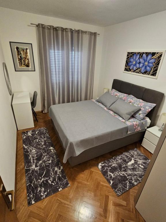 Posteľ alebo postele v izbe v ubytovaní Apartments Grgic