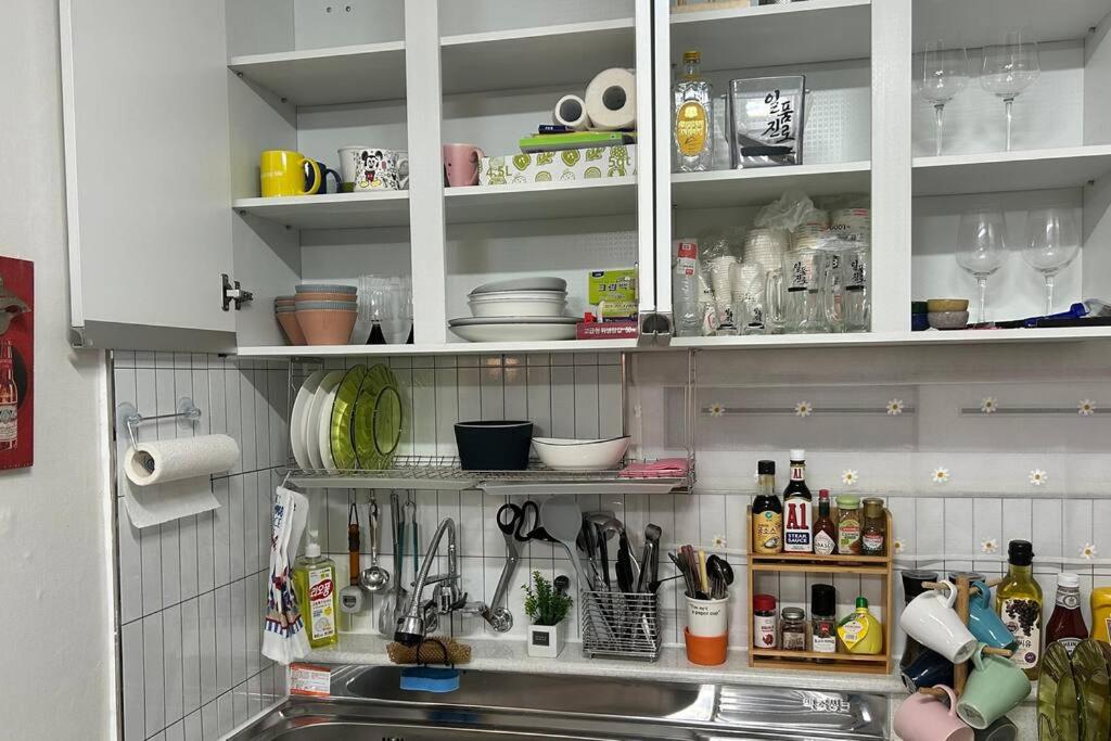 Kuchyň nebo kuchyňský kout v ubytování Homey inn Juno