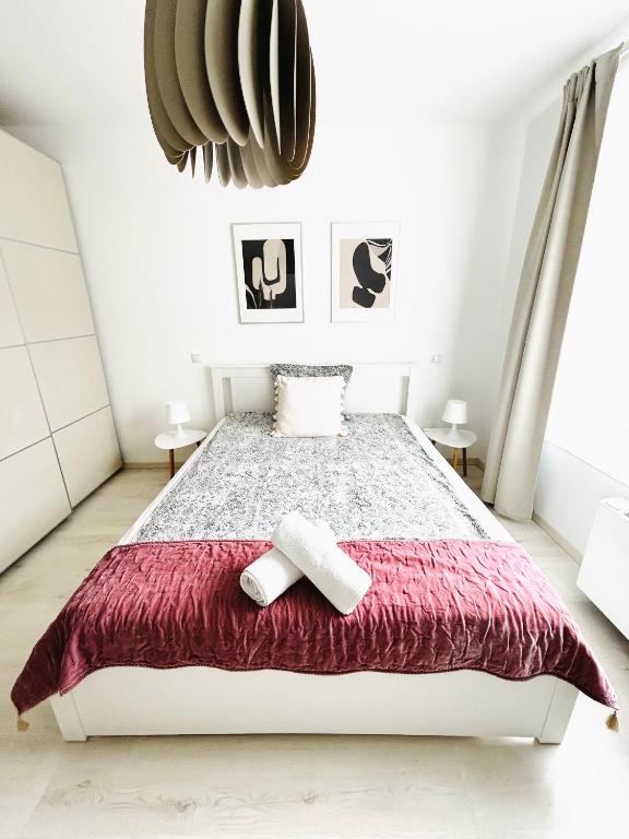 Łóżko lub łóżka w pokoju w obiekcie Elizabeth Garden Premium Apartment