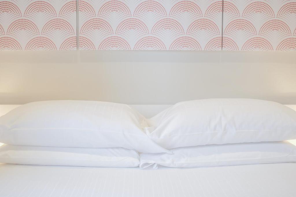Postel nebo postele na pokoji v ubytování Naboo Verona Luxury Suites