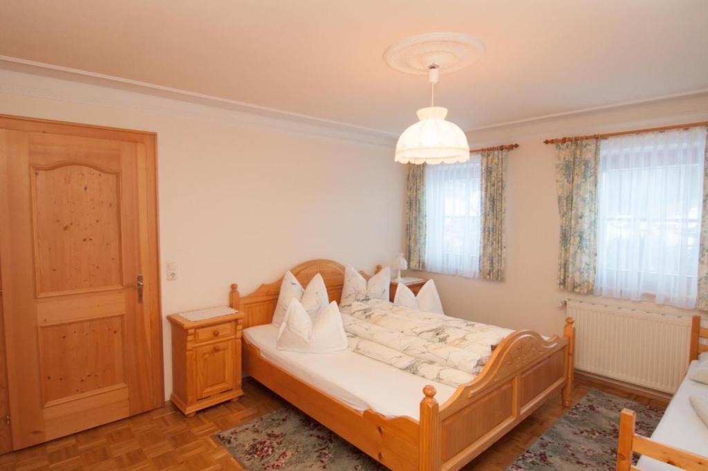 Postel nebo postele na pokoji v ubytování Mooserhof