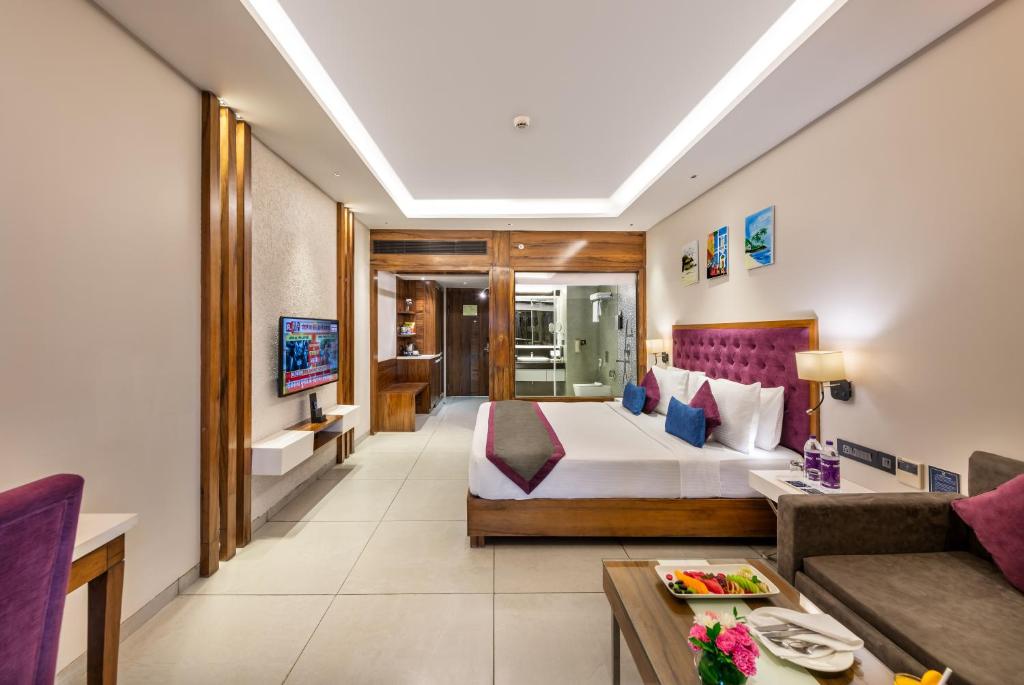 Posezení v ubytování Golden Tulip Candolim, Goa
