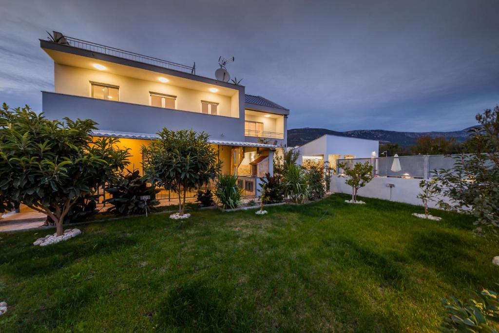 Zahrada ubytování Ferienhaus Elias Nikola
