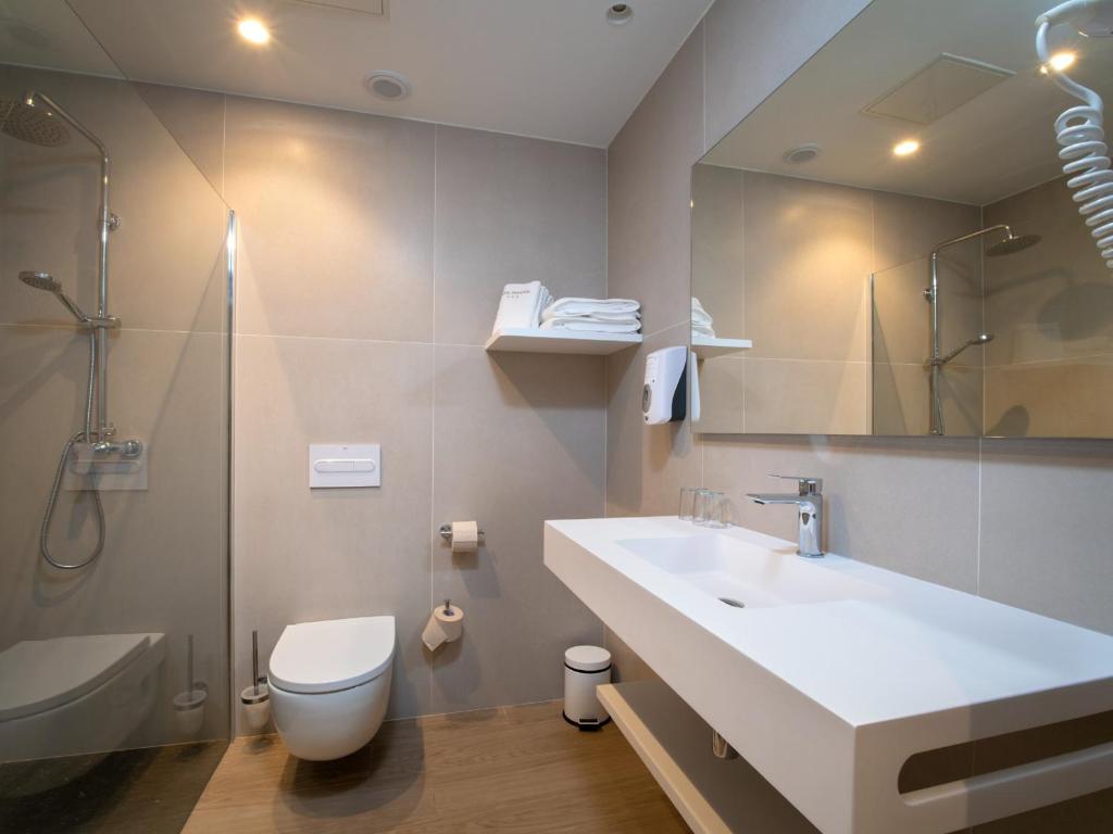 Koupelna v ubytování Hotel Trinkete