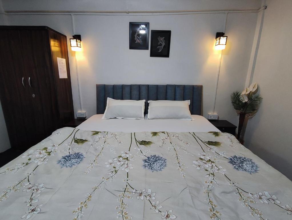 Postel nebo postele na pokoji v ubytování Haven Eleven Homestay