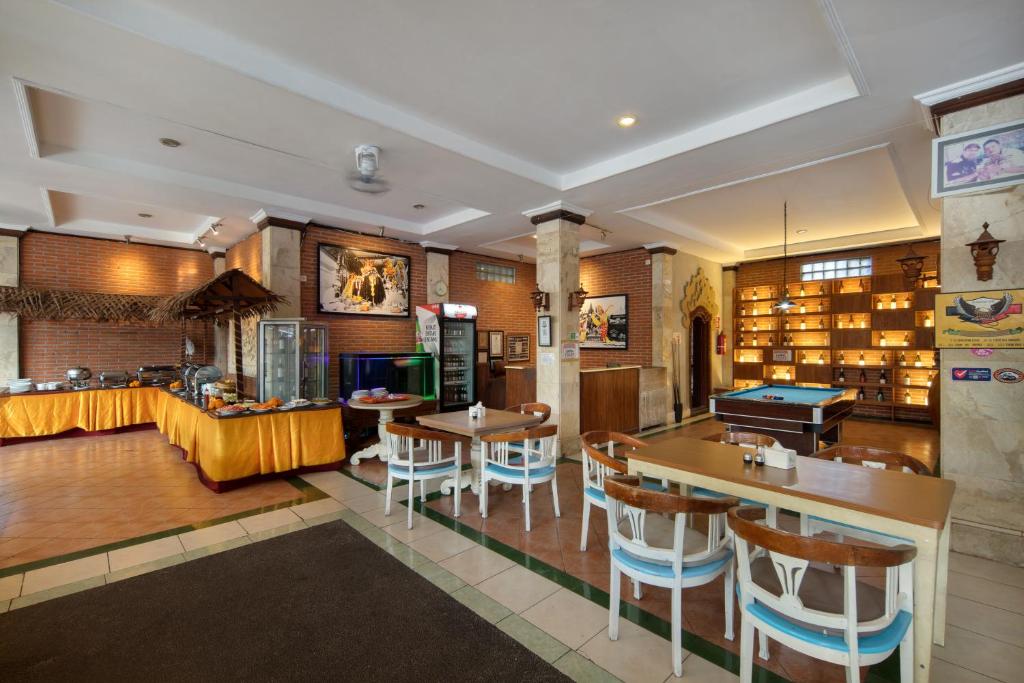 TV a/nebo společenská místnost v ubytování Legian Village Hotel - CHSE Certified