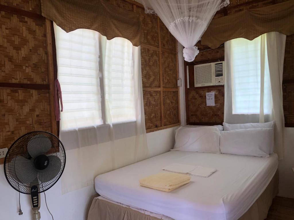 Postel nebo postele na pokoji v ubytování MIOKI HOMETEL