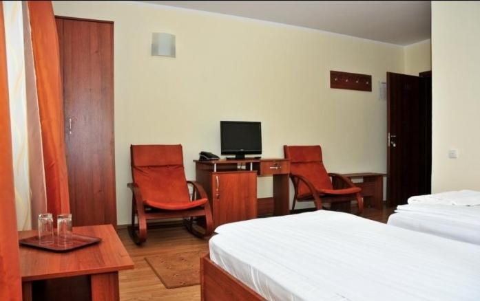 TV a/nebo společenská místnost v ubytování JRB Hotel