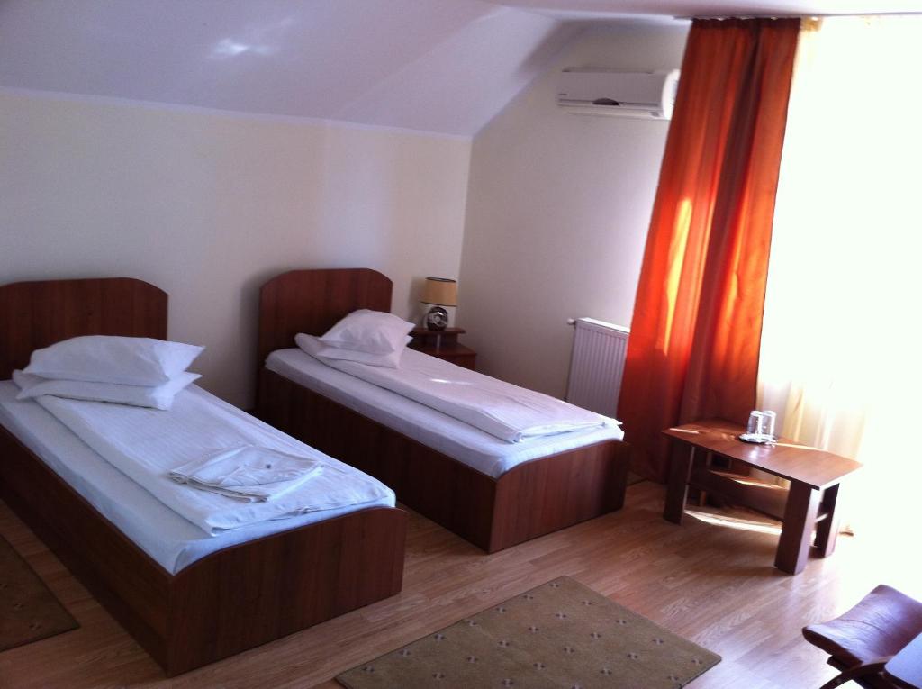 Postel nebo postele na pokoji v ubytování JRB Hotel