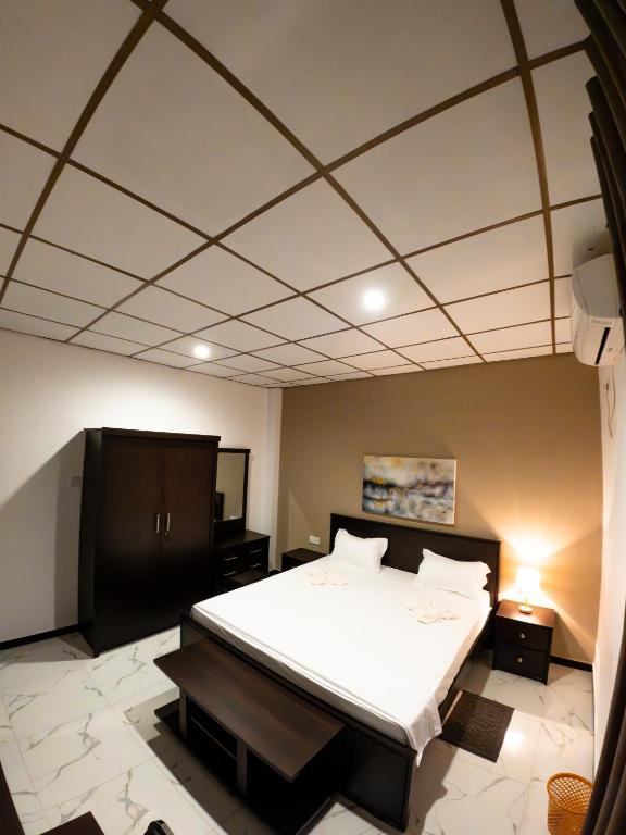 Postel nebo postele na pokoji v ubytování Nilo Lanka Hotel