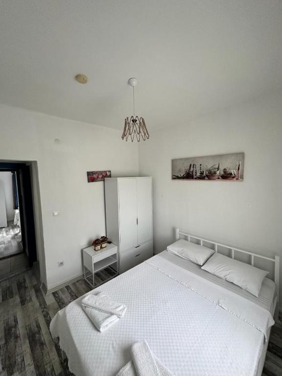 Postel nebo postele na pokoji v ubytování Denizati Pension