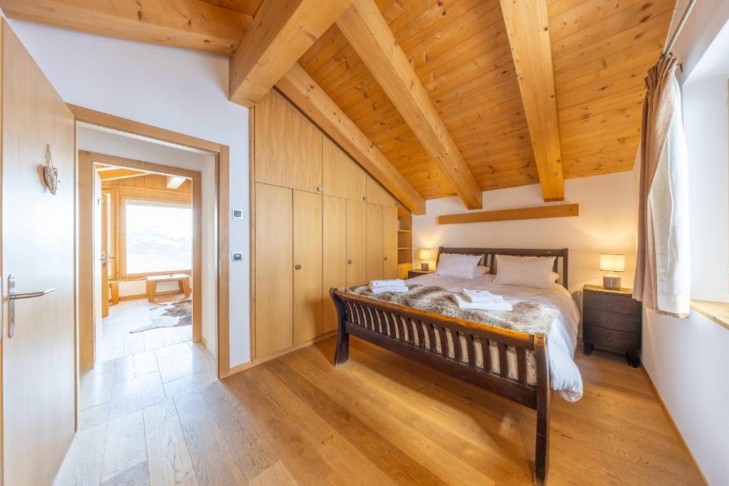 Postel nebo postele na pokoji v ubytování Chalet Enchanteur