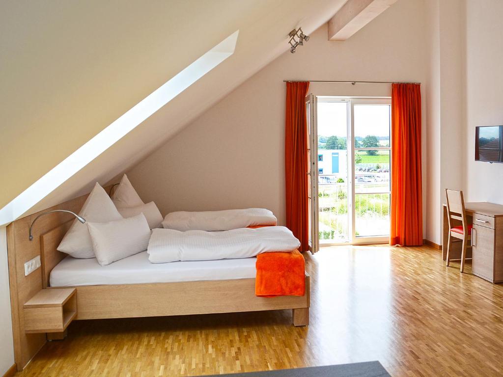 Postel nebo postele na pokoji v ubytování Apparthotel Ampertal