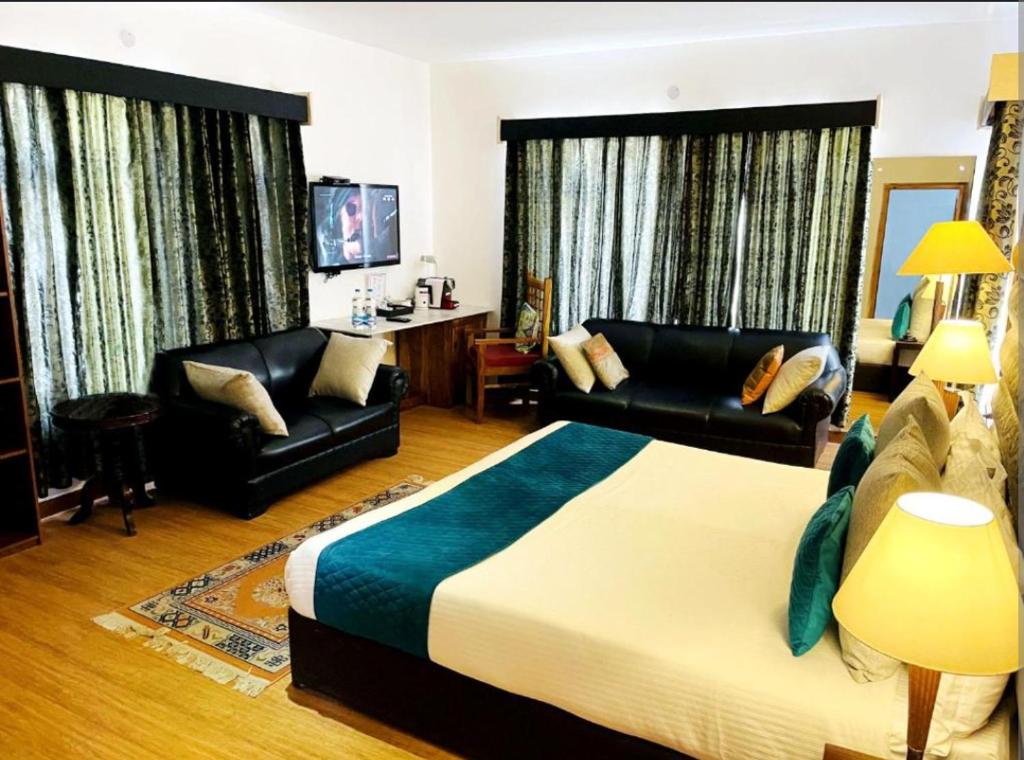 TV a/nebo společenská místnost v ubytování Gomang Boutique Hotel