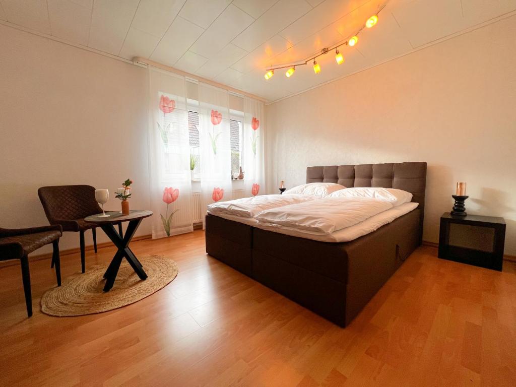 Posteľ alebo postele v izbe v ubytovaní Schönes Zimmer am Jans Kamp 3 mit Küche Self-Check-In