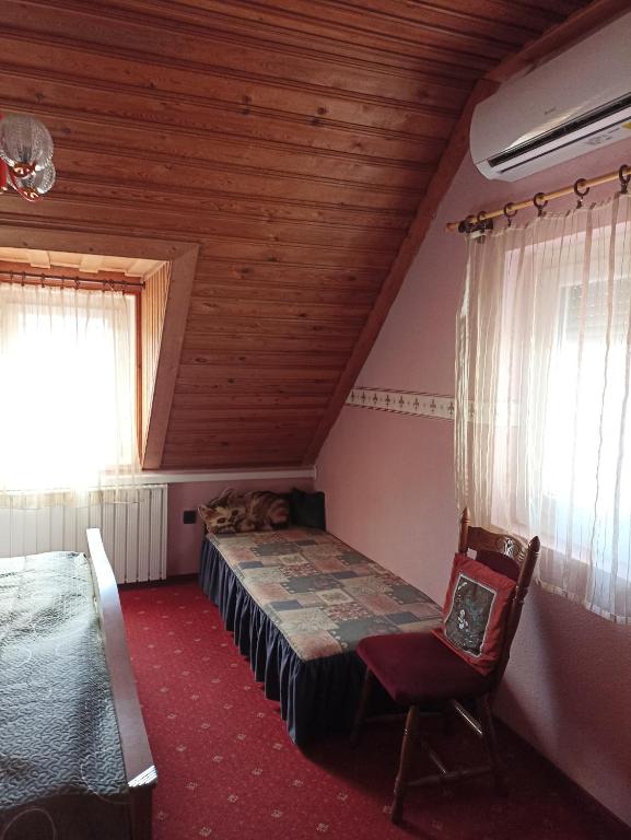 Posteľ alebo postele v izbe v ubytovaní Ginkgo Apartman