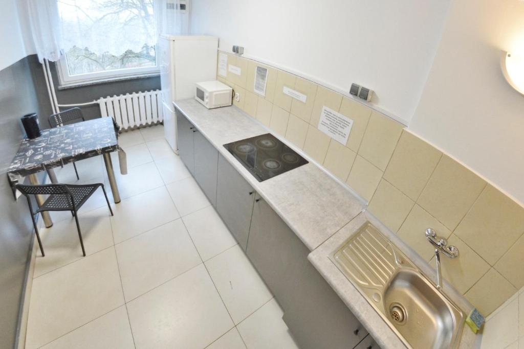 Kuchyňa alebo kuchynka v ubytovaní Twój Hostel Bytom
