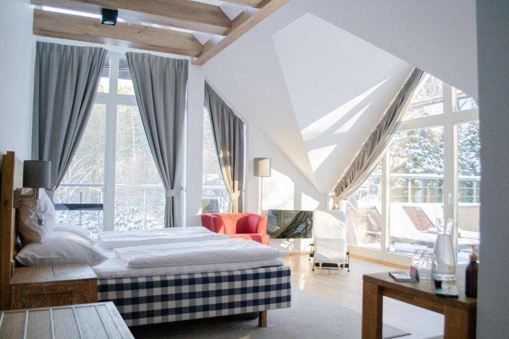 Postel nebo postele na pokoji v ubytování Resort CATTALEYA