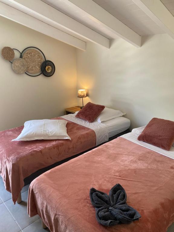 Postel nebo postele na pokoji v ubytování CARIBBEAN RESIDENCE