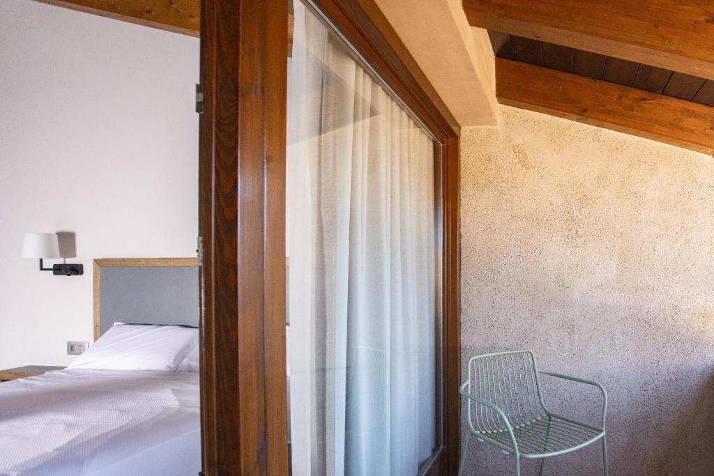 Postel nebo postele na pokoji v ubytování Abbatissa Hotel Restaurant