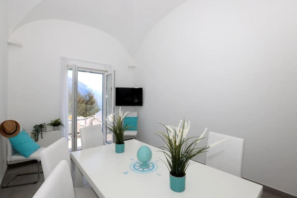 TV a/nebo společenská místnost v ubytování Villa Dei in Positano