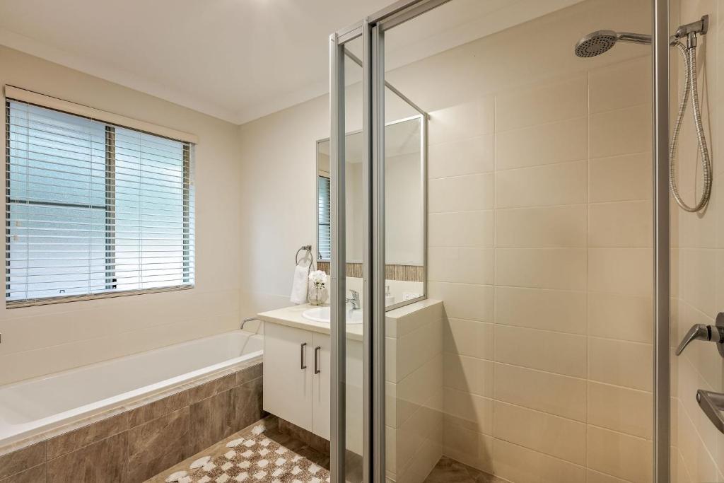 a bathroom with a shower and a sink at Villa 16 @ Rivendell Winery Estate - Yallingup in Yallingup Siding